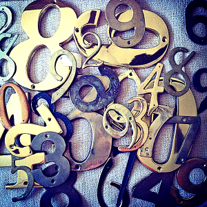 Make a focal wall with vintage house numbers