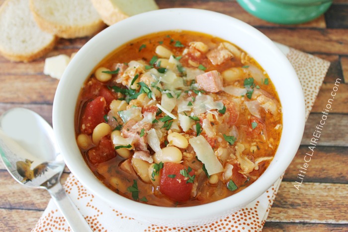 Slow Cooker Pork and Sausage Cassoulet Recipe - so hearty and at 239 calories a serving it is a perfect way to warm up while watching the waistline.