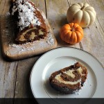What a fun twist on a pumpkin roll. It looks delicious and I've gotta try it. Says it's easy - so I guess I'm adding Pecan Pumpkin Roll to my Thanksgiving menu.