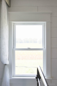 A little trim goes a long way into making windows more impressive in this farmhouse style window trim.